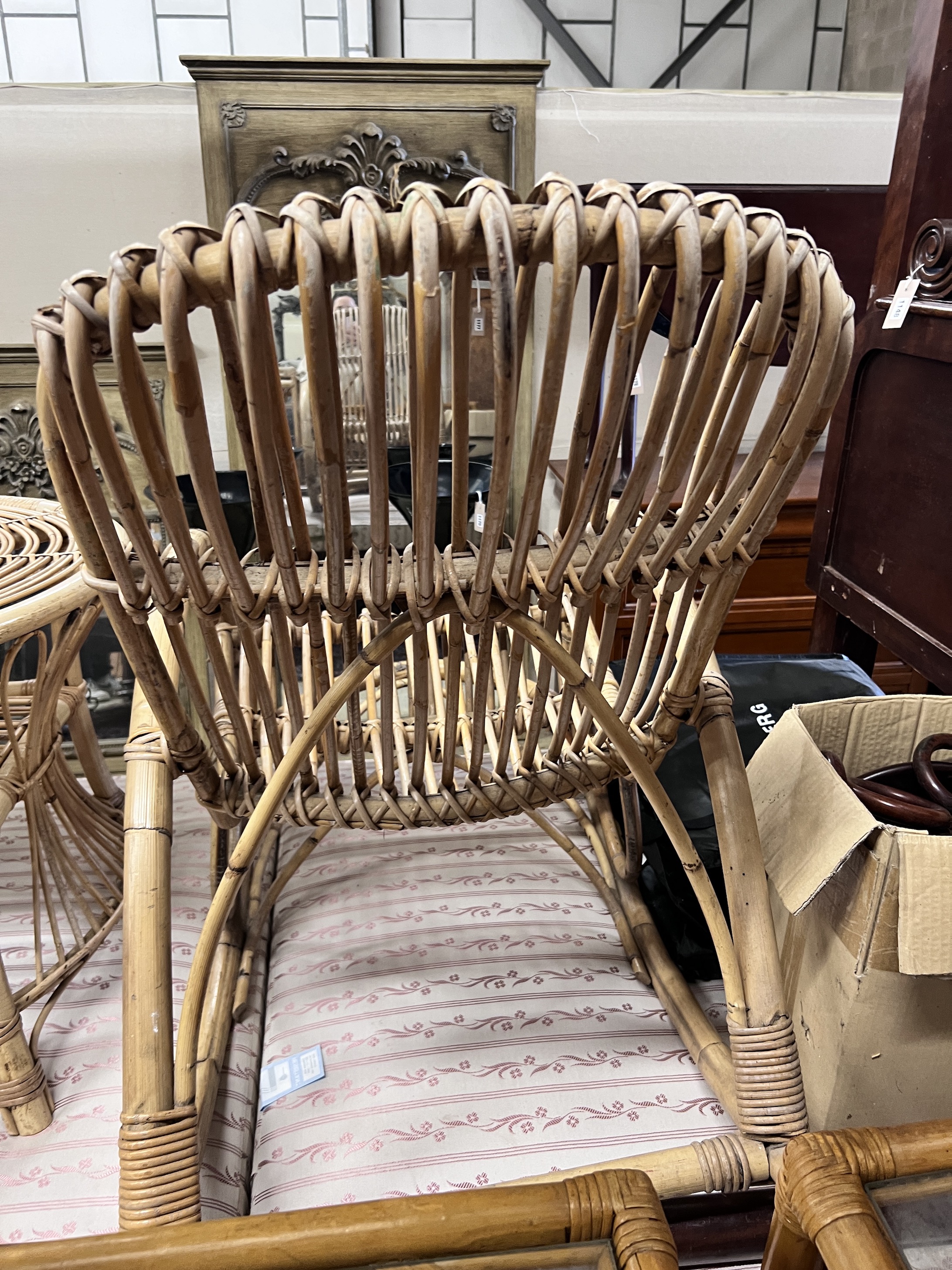 A Franco Albini rocking chair with coffee table, two side tables and a pair of plant stands